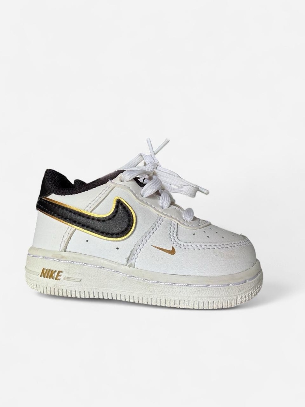 Nike Baby Air Force 1 lv8 TD White & Black Sneaker with Gold Accent